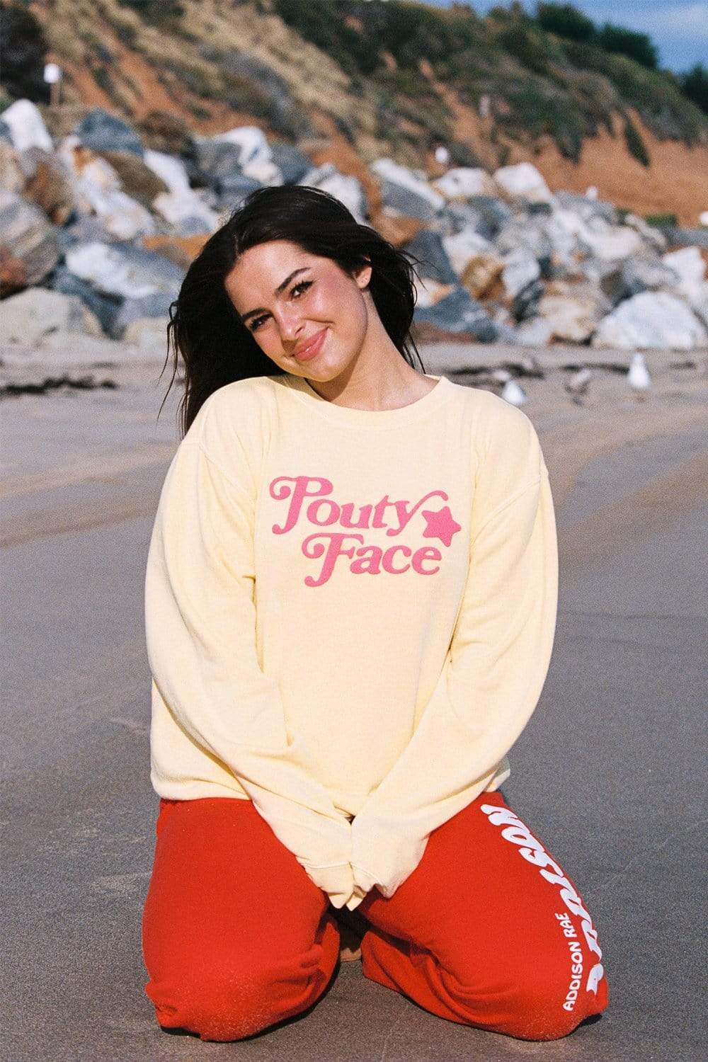 Addison Rae: Pouty Face Yellow Crewneck – thesill2bn.com